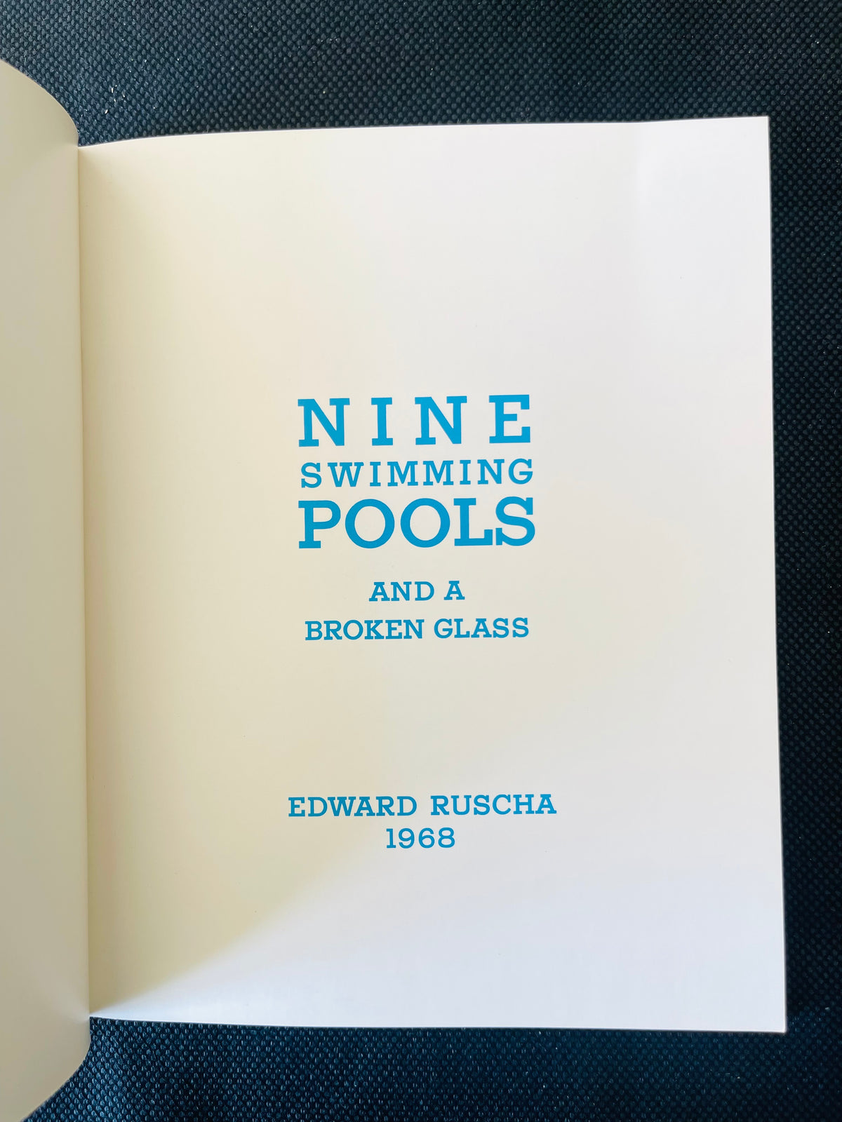 Ed Ruscha
Nine Swimming Pools and A Broken Glass 1976 inscribed by Michael Childers